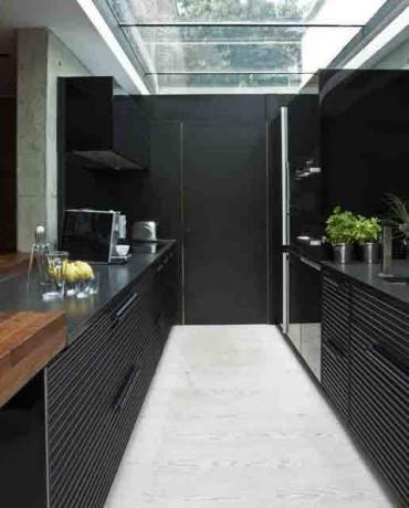 Black kitchens in the interior - luxurious simplicity of minimalism