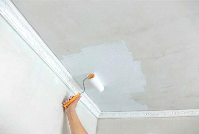 Photo of painting the ceiling.