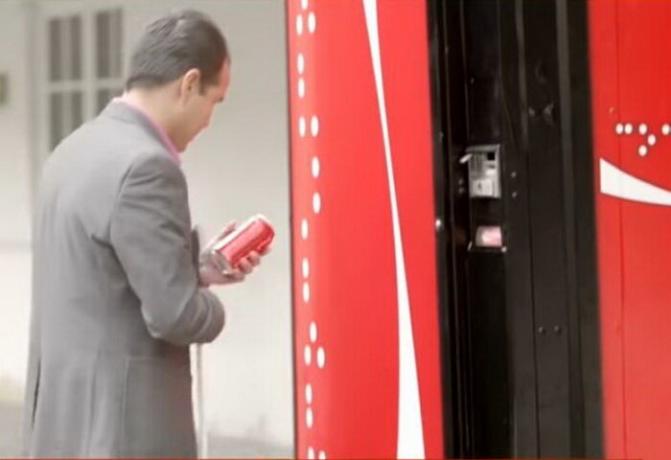 Braille on the Coca-Cola bank for the visually impaired.