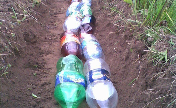 Drainage for portion of plastic bottles