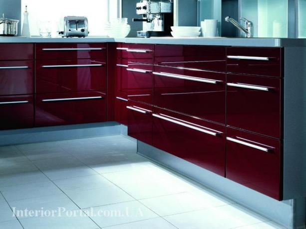 The chic burgundy luster in our kitchen will certainly hint to guests that its owner is a respectable, worthy person.