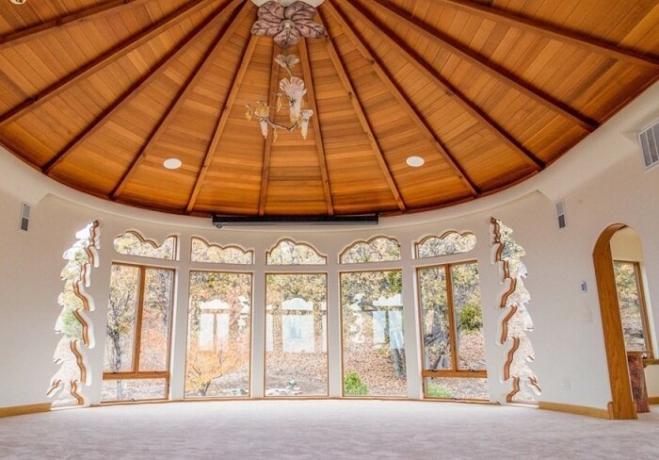 Shining Hand Ranch. Wooden living room dome.