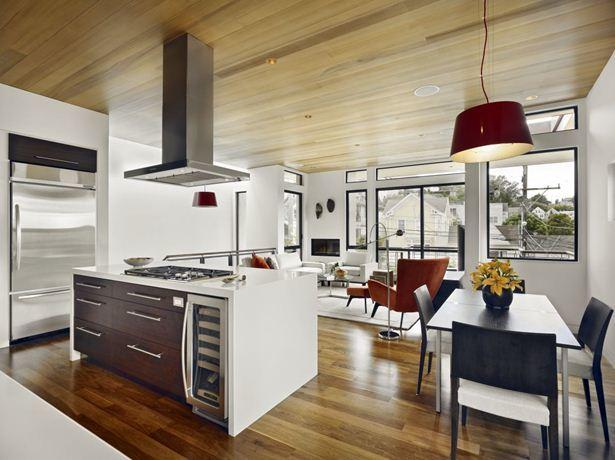 Wooden ceilings for the kitchen are definitely worth choosing if the room is decorated in an eco-style or the floor is lined with parquet / laminate