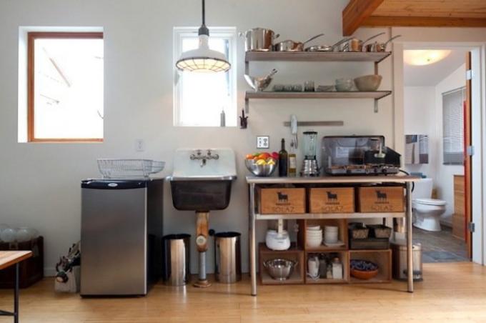 Kitchenette in a house that has been converted from a garage.