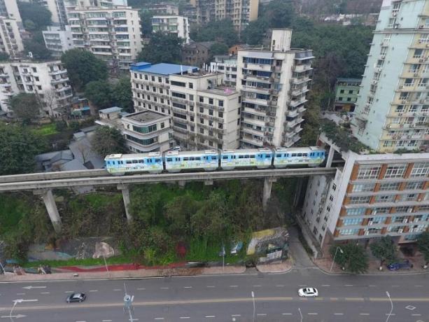 In the Chinese city of Chongqing trains run through the house.