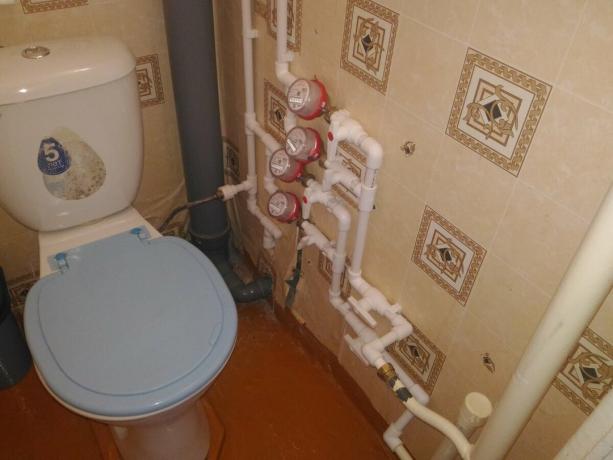 Plumbing toilet connected to the hot water