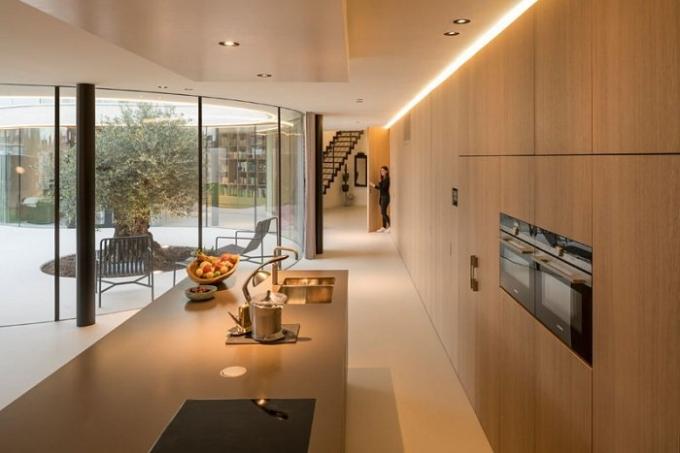 Excellent illuminated kitchen with views of the olive tree.