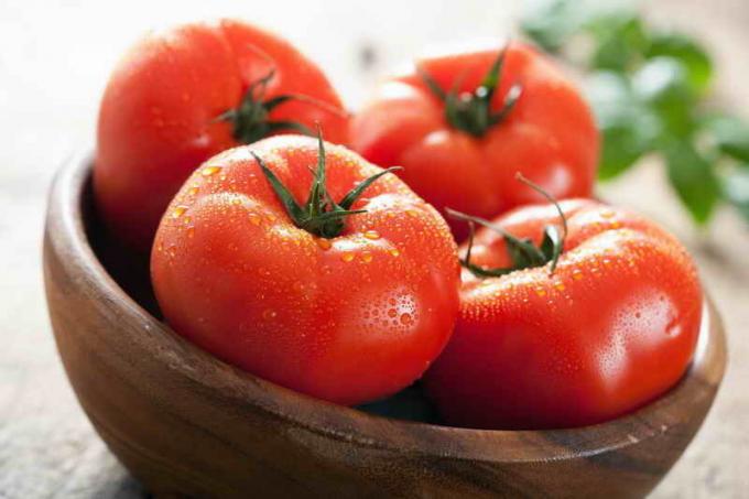 Harvested tomatoes. Illustration for an article is used for a standard license © ofazende.ru