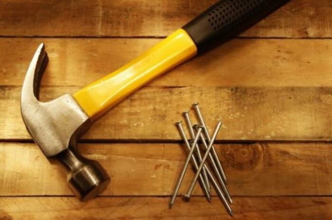 Hammer - a key household tools.