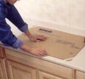 The template should have been attached to the sink, the packaging usually has a dotted line