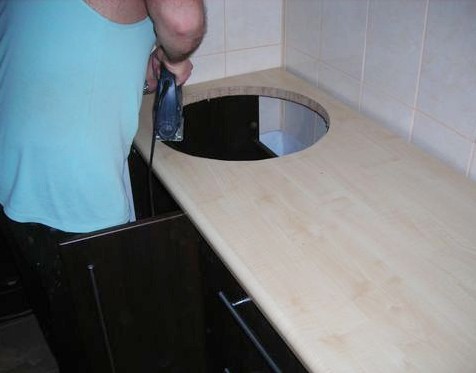 Cut the hole for the sink carefully.