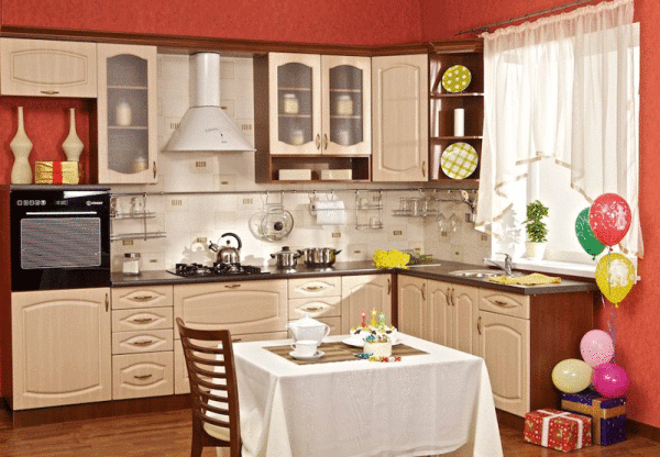 Red kitchen, with a beige set, created in a square room