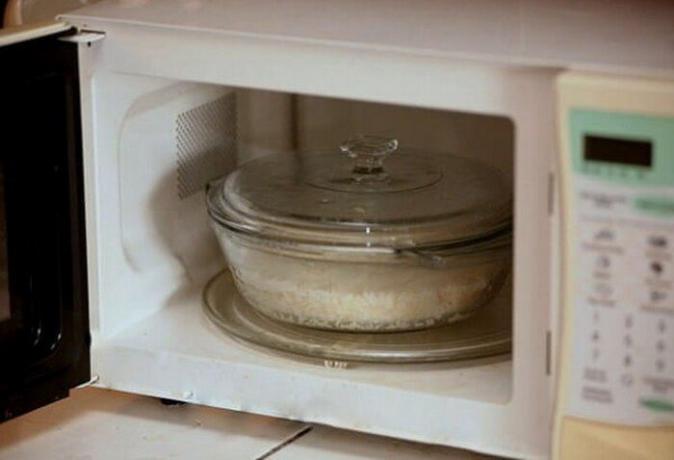 Rice in a microwave oven is preparing for 9 minutes.