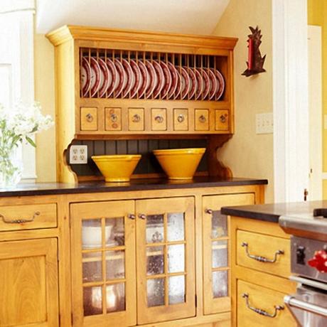 Open shelves with dishes placed on them will show that the owner of the house loves to cook.