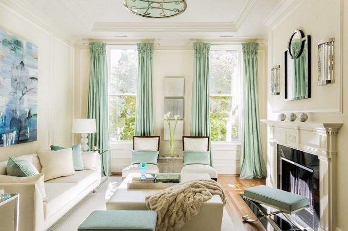 Tall curtains visually stretched space