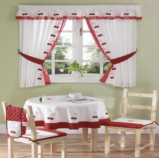Curtains and other kitchen textiles from the same fabric look great together