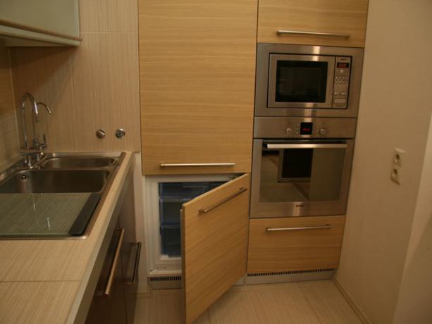 Refrigerator, oven and microwave in a furniture set