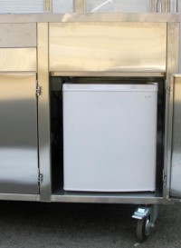 beige refrigerator in the interior of the kitchen