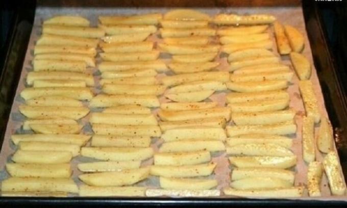 Wedges spread on a baking sheet.