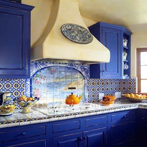 Photo of a blue kitchen on a background of light walls