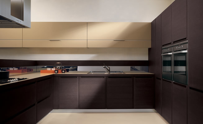 The beige-brown-gray kitchen has a modern look.