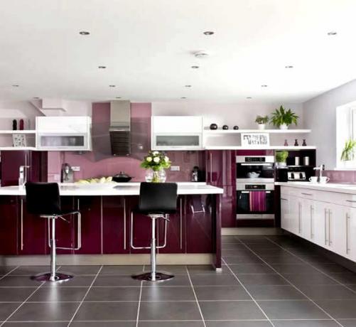 Photo of an original kitchen that combines white and ripe plum