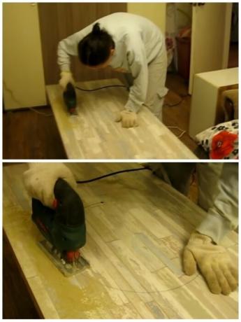 Use the jigsaw holes under the sink and gas stove, Anna made herself. | Photo: youtube.com.