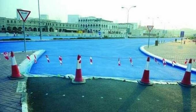 Why Qatar authorities require painting asphalt in blue